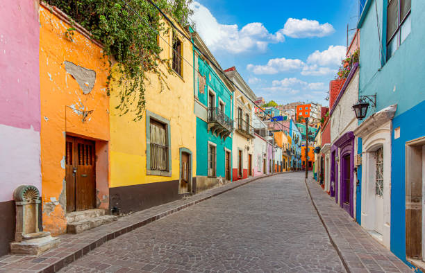 Guanajuato, Mexico, Scenic cobbled streets and traditional colorful colonial architecture in Guanajuato historic city center Guanajuato, Mexico, Scenic cobbled streets and traditional colorful colonial architecture in Guanajuato historic city center. colonial style photos stock pictures, royalty-free photos & images