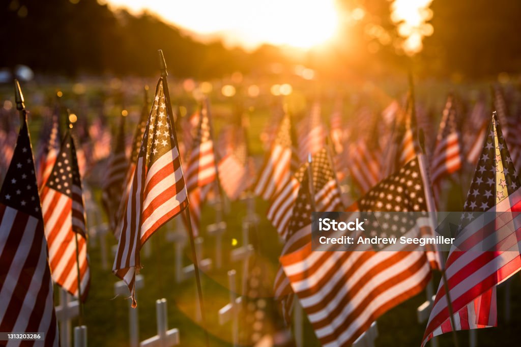 American flag memorial A field of American flags set up for a Memorial Day parade US Memorial Day Stock Photo