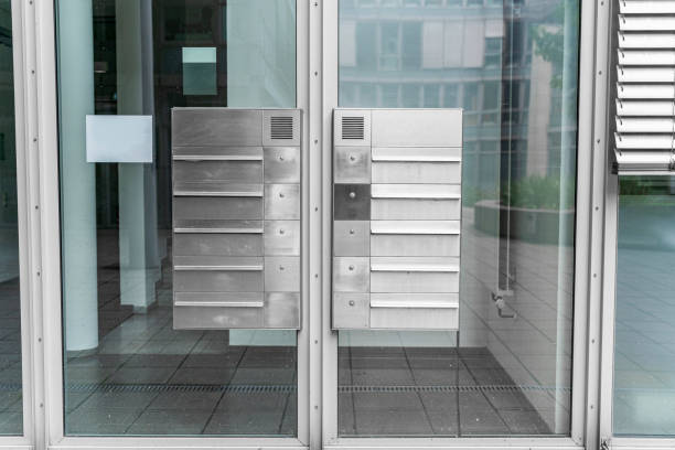 istock Metal weaving new modern mailboxes in a row on an office building 1313211430