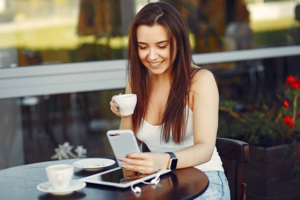 istock Businesswoman with tablet working in a cafe 1313213049