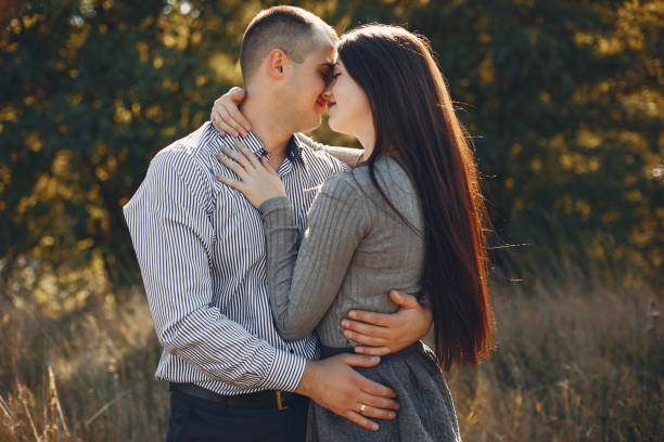istock Beautiful couple spend time in a summer park 1313213140