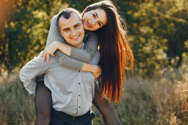 istock Beautiful couple spend time in a summer park 1313213155