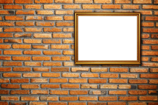 istock Gold vintage photo frame on red brick wall 1313213419