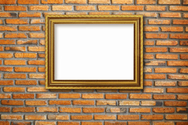 istock Gold vintage photo frame on red brick wall 1313213439