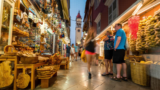 Corfu Timelapse at night old town streets with many tourists and pedestrians