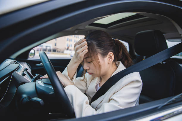 istock Stressed woman sitting in a car 1313216833