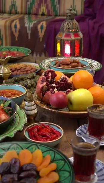 Ramadan holiday food on the table. Arabic Cuisine: Middle Eastern traditional Iftar dinner. Assorted of Egyptian oriental dishes. Vertical foto