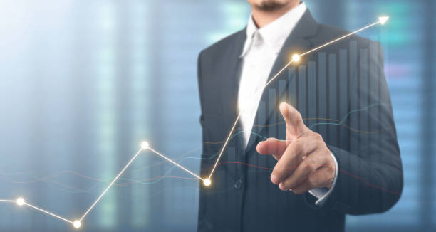 istock Businessman plan graph growth and increase of chart positive indicators 1313217835