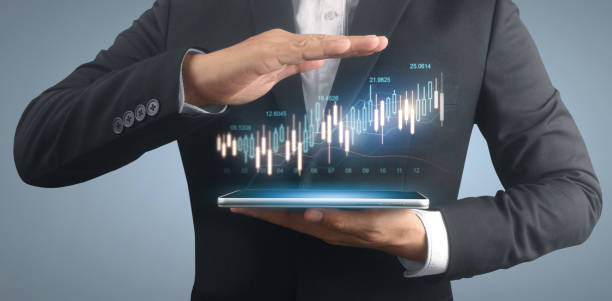 istock Businessman plan graph growth increase of chart positive indicators in his business,tablet in hand 1313217839