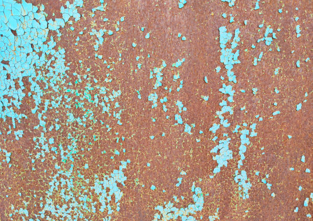 Multicolor background, rusty metal surface with cracking blue paint, weathered old texture