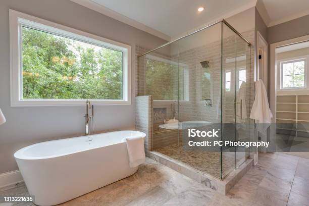 Large Glass Shower And Free Standing Bathtub Stock Photo - Download Image Now - Bathroom, Free Standing Bath, Luxury