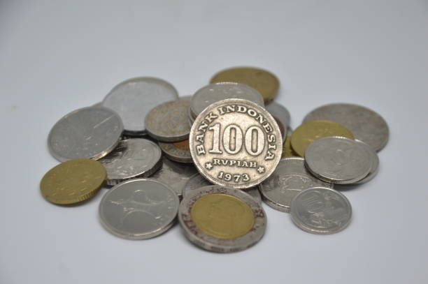 istock Stack of penny coins from many countries 1313222482