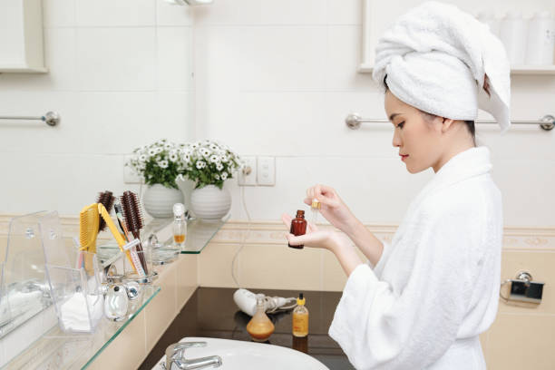 istock Woman applying moisturizing serum 1313224425