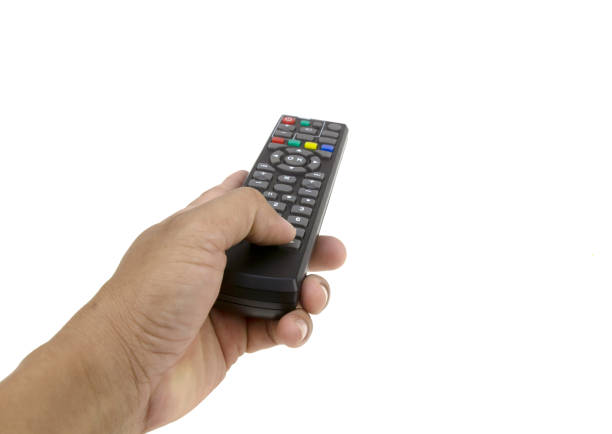istock Hand holding remote control isolated on white background 1313225592