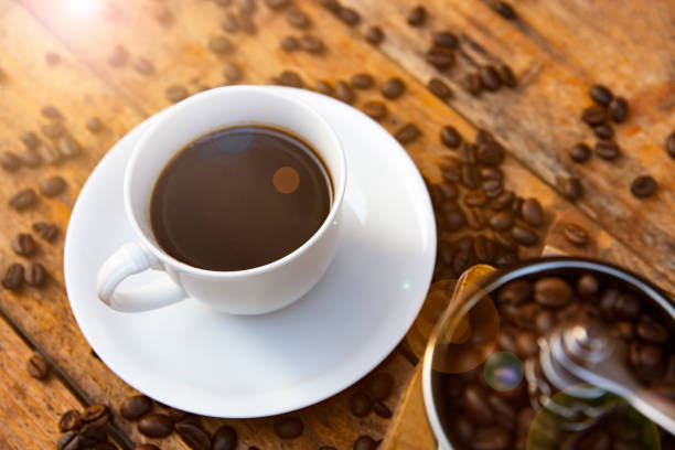 istock Coffee in the cup and the grinding coffee beans 1313226319