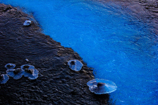 istock Volcanic black and blue waters with special ice plates 1313226433