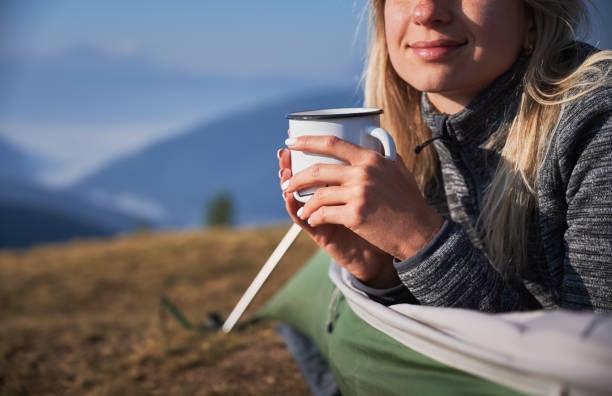 istock Coffee break while vacation in tent in fresh air. 1313227127
