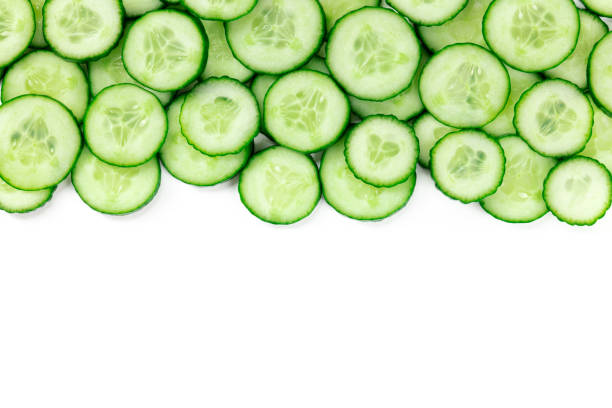 istock Cucumber background with copy space, overhead flat lay shot 1313227138
