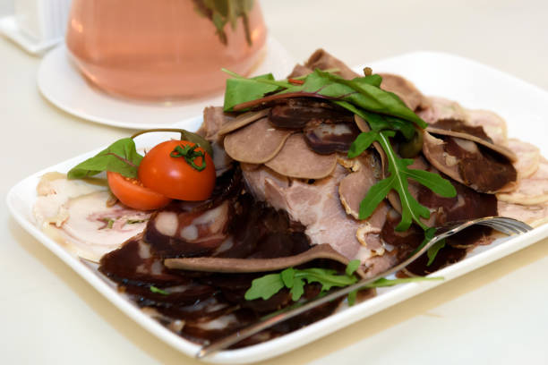 istock Cold cuts of meat on a plate. 1313227652