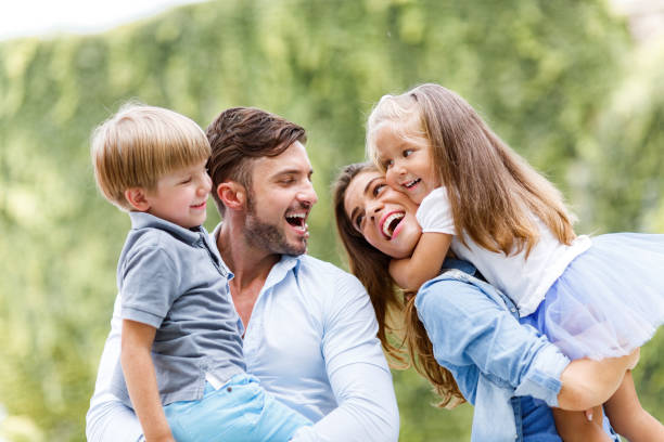 istock Young happy family spending time in nature. 1313228450