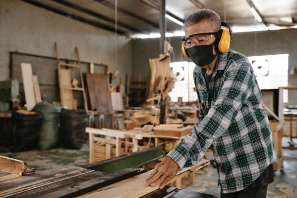 istock Senior man working with wood 1313229172
