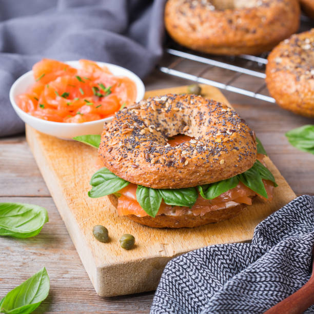 istock Bagels with cream cheese and salmon. Plating, fast lunch, meal. 1313231423