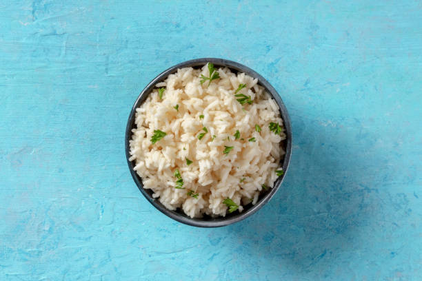 istock Rice with fresh parsley leaves 1313232118