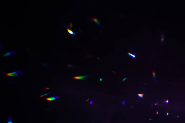 istock colorful warm rainbow crystal light leaks on black background 1313234512