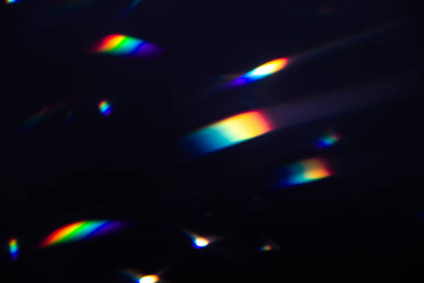 istock colorful warm rainbow crystal light leaks on black background 1313234645