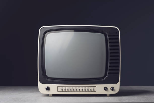 istock Vintage analog TV on blue background 1313236954