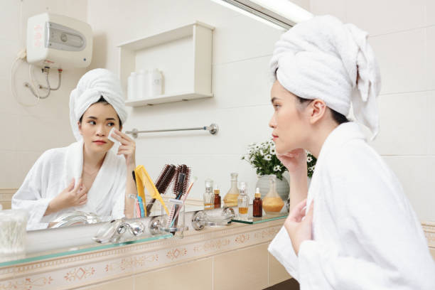 istock Woman applying face toner 1313237200