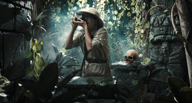 istock Brave adventurer exploring the jungle and shooting 1313238809