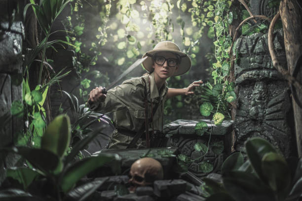 istock Brave woman exploring the jungle 1313238880