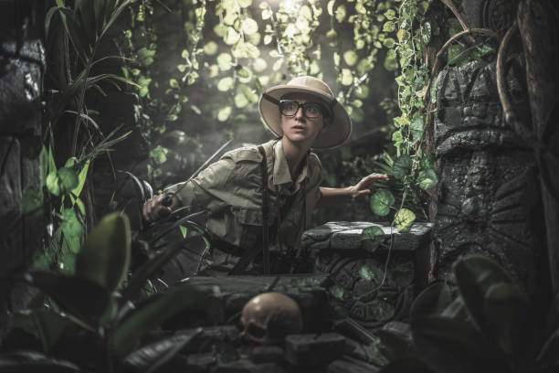 istock Brave woman exploring the jungle 1313239648