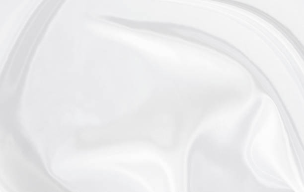 istock White gray satin texture that is white silver fabric silk background with beautiful soft blur pattern natural. 1313239798
