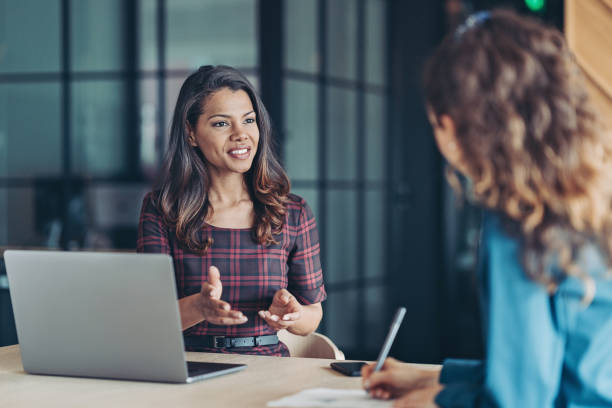 istock Two businesswomen working together 1313239838