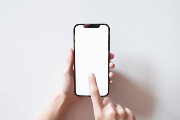 istock Smartphone mockup. Businesswoman hand using phone white screen. Isolated on white background. 1313240632
