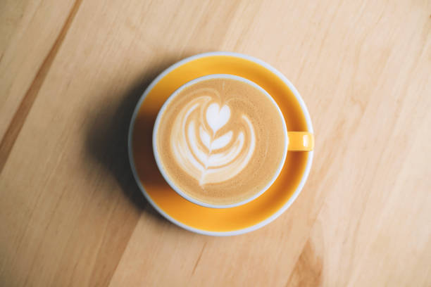 istock Fresh flavored coffee art is on the wooden table. 1313241240