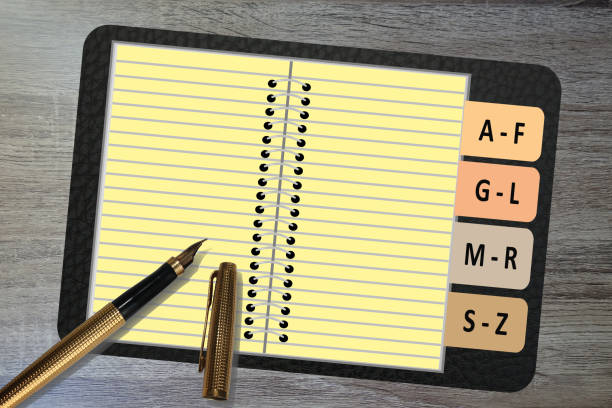 Alphabetical directory  Spiral notebook  Fountain pen  Copy space