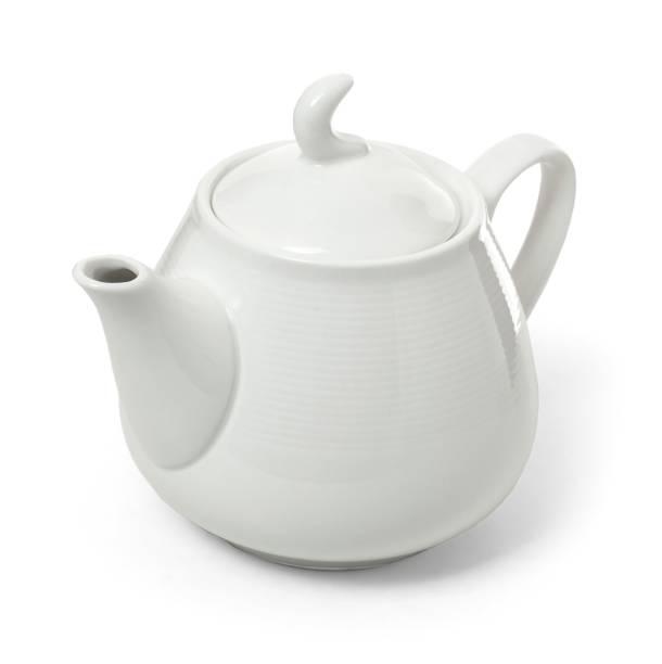istock White porcelain teapot isolated on white background. Ceramic tableware 1313245400