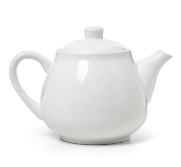 istock White porcelain teapot isolated on white background. Ceramic tableware 1313245427