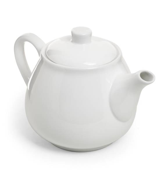 istock White porcelain teapot isolated on white background. Ceramic tableware 1313245433