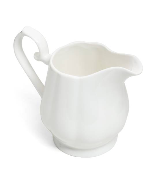 istock Porcelain sauce boat, pitcher, creamer or ceramic gravy boat isolated on withe 1313245497