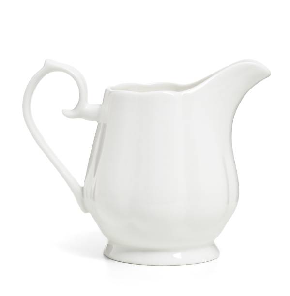 istock Porcelain sauce boat, pitcher, creamer or ceramic gravy boat isolated on withe 1313245500
