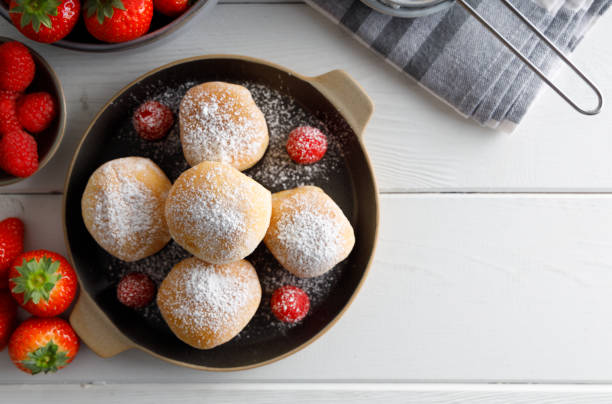 istock Homemade fritters filled with strawberry and raspberry jam. 1313246043