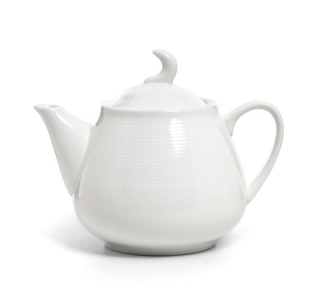 istock White porcelain teapot isolated on white background. Ceramic tableware 1313246071