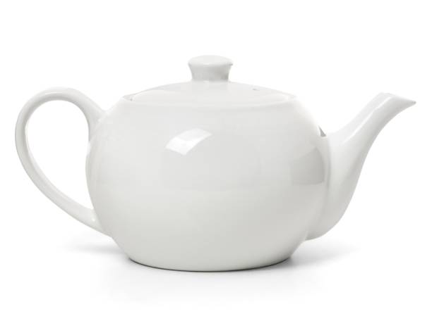 istock White porcelain teapot isolated on white background. Ceramic tableware 1313246072