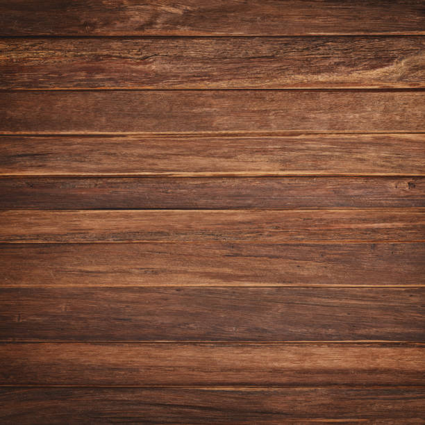 istock wood table texture, dark planks background for design 1313248068