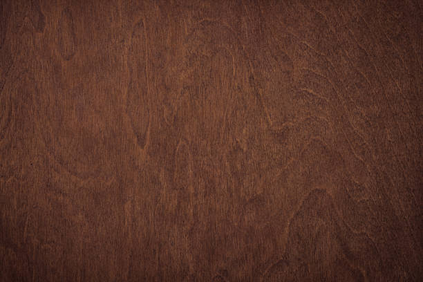 istock dark plank wall, wood texture background. brown board with natural pattern 1313248101