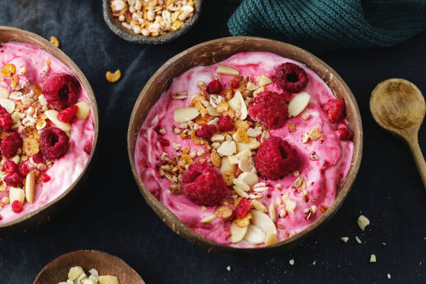istock Muesli granola with yogurt and berries served in bowl on table. 1313249380